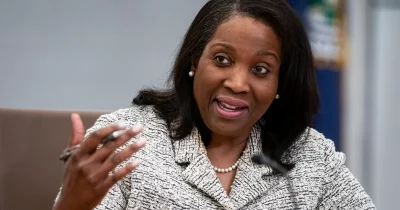 Fed Governor Cook Signals Readiness to Raise Rates If Inflation Persists