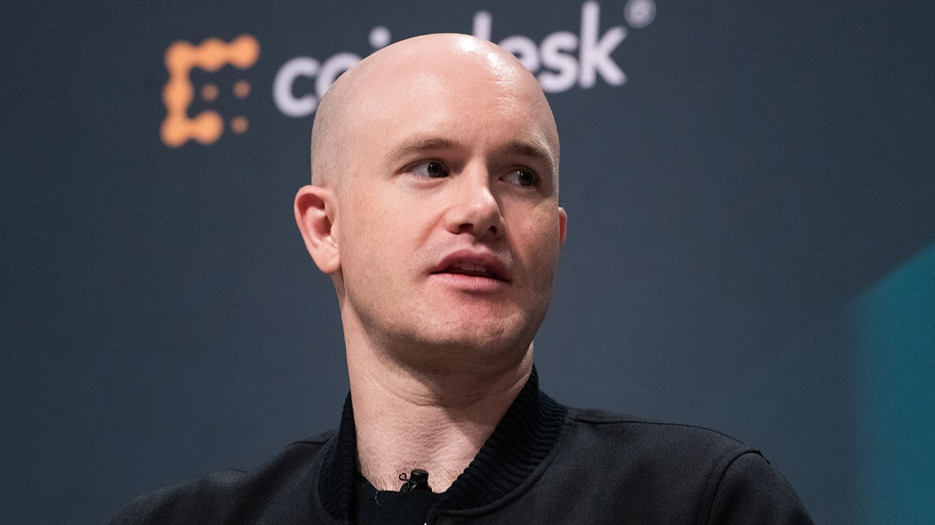 Coinbase Spot Trading Slump Prompts Analyst Downgrades Ahead of Earnings