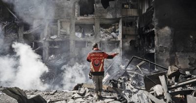 Israeli Airstrike in Beirut Draws Iranian Retaliation Threat as IDF Reinforces Borders