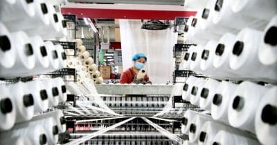 China Factory Output Flatlines in May, Raising Concerns Over Economic Momentum