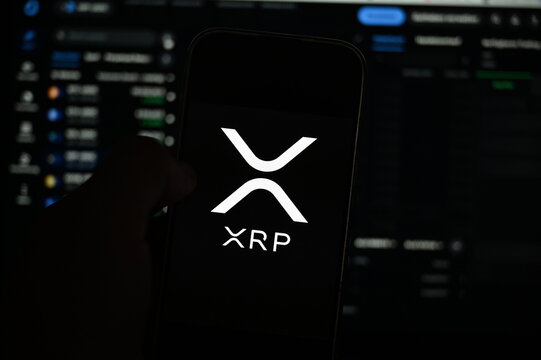 XRP Eyes $2 Breakout as Analysts Point to XLM Correlation and Falling Wedge Pattern