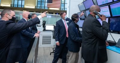 Bitcoin, Ether Slide as Nasdaq Sinks on AI Spending Fears