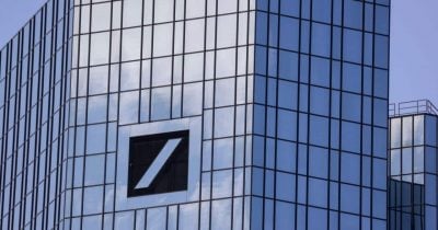 Deutsche Bank Slashes Gold Price Forecast 22% Amid US Policy Concerns
