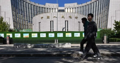 China Bond Yields Dip on Easing Hopes, Lifting Gold's Appeal