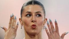 Sprinter Amy Hunt's Nails Grab Headlines as Crypto Market Faces Thin Liquidity
