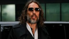 Woman Describes Russell Brand Alleged Assault as 'Frenzied' in Court Testimony